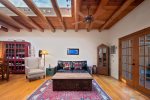 Traditional Santa Fe living room flooded with natural light